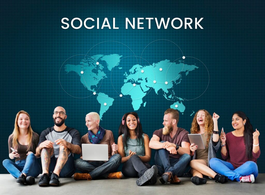 A group of friend setting in front of the social network map. This is a good representation of an online community.